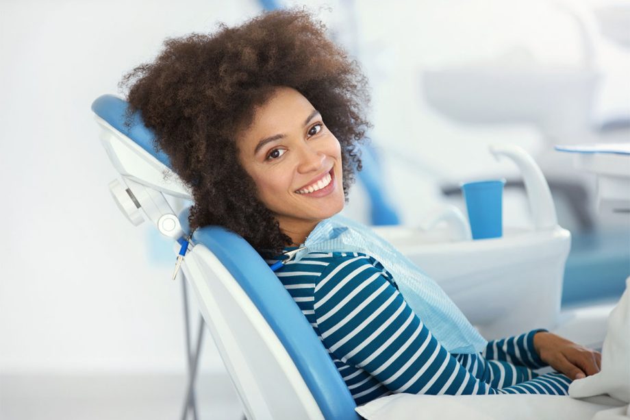 Lady smiling in dentist chair