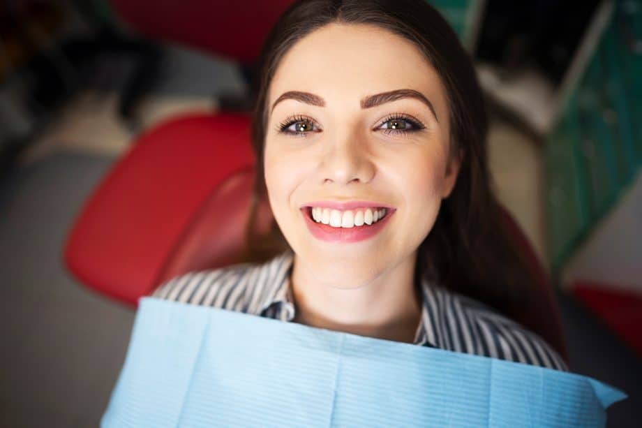 woman smiling in dental chair